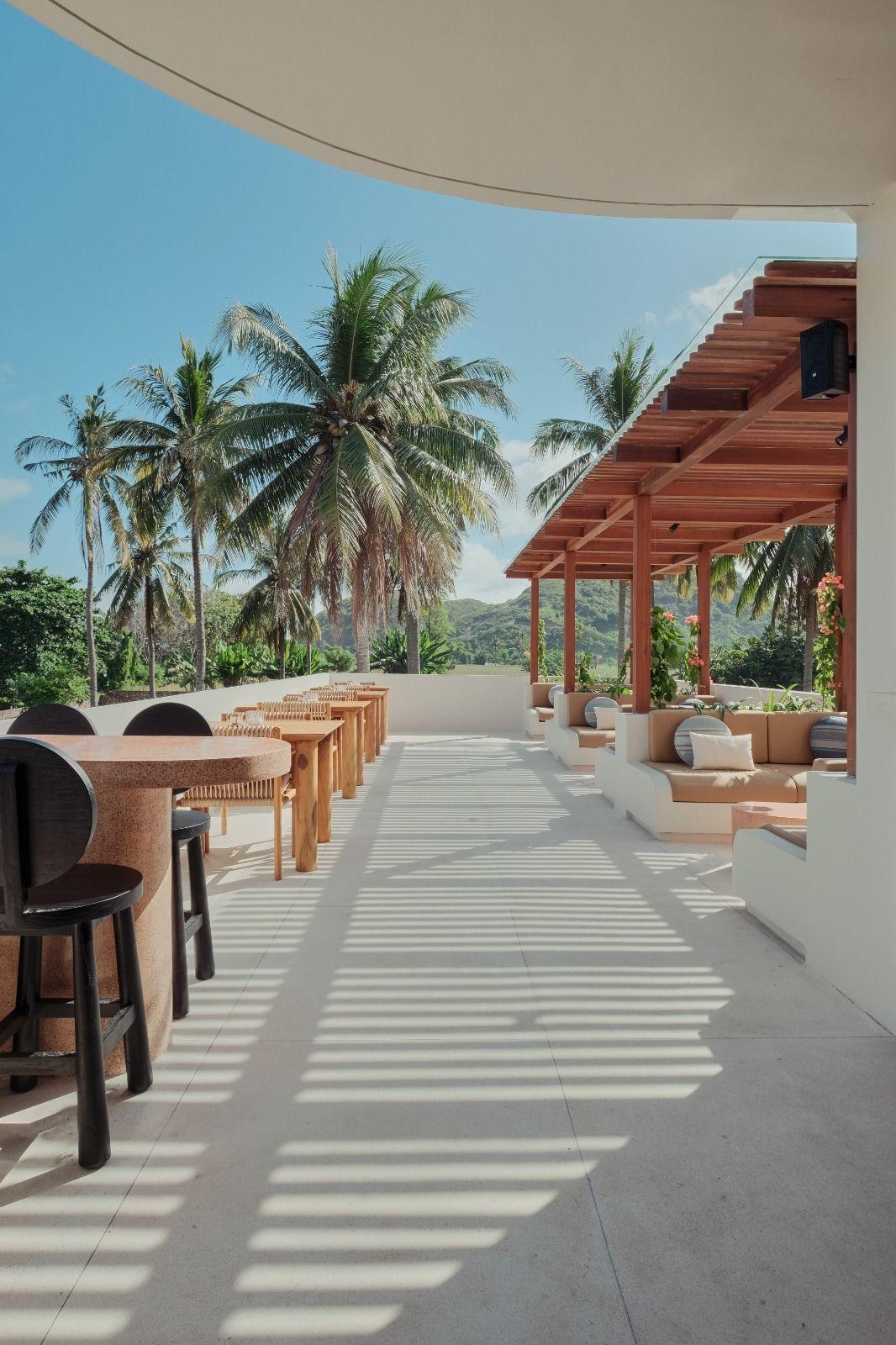 The rooftop bar at Boni Beach with stunning mountain sunset views